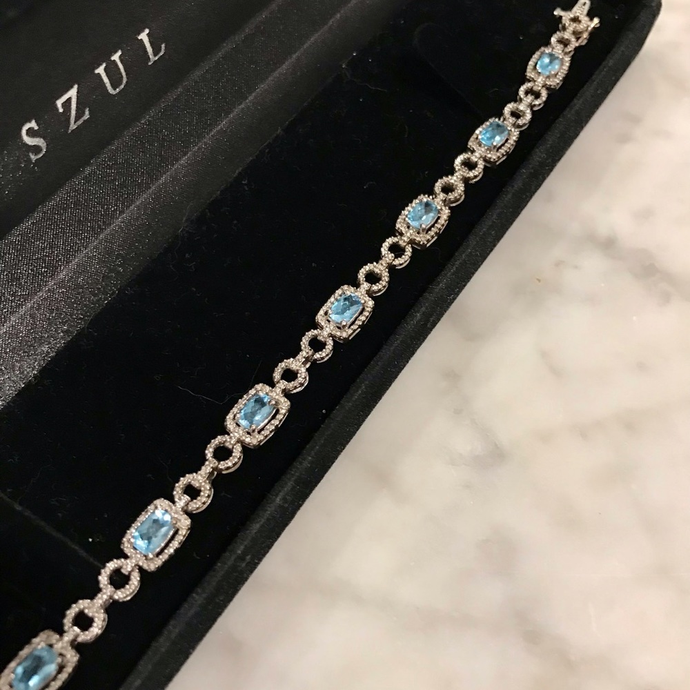 Blue topaz and diamond bracelet, sterling silver, 7” length